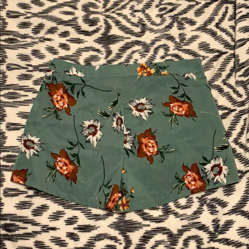 Green floral shorts